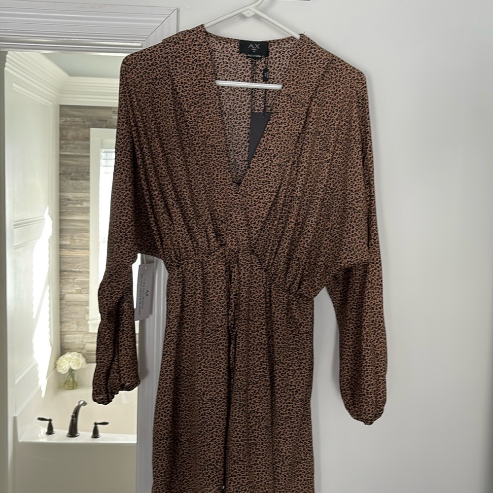 Long sleeve cheetah print dress
Size 4